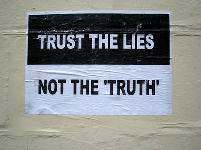 fly poster graffiti trust the lies
